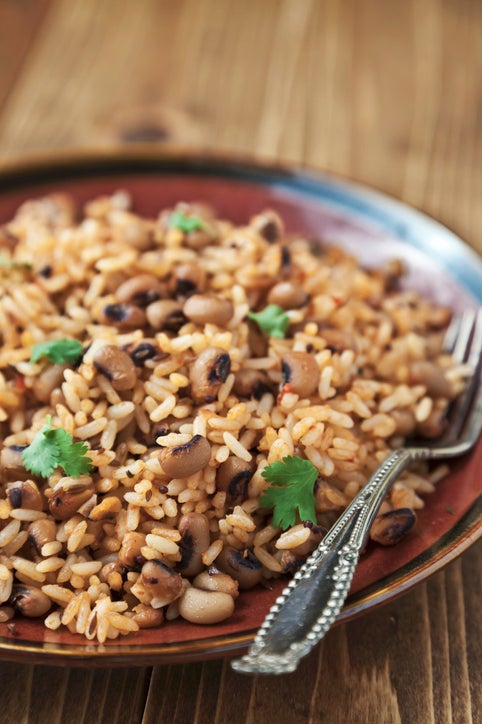 Rice and black eyed peas with cumin and mustard seeds topped with fresh cilantro