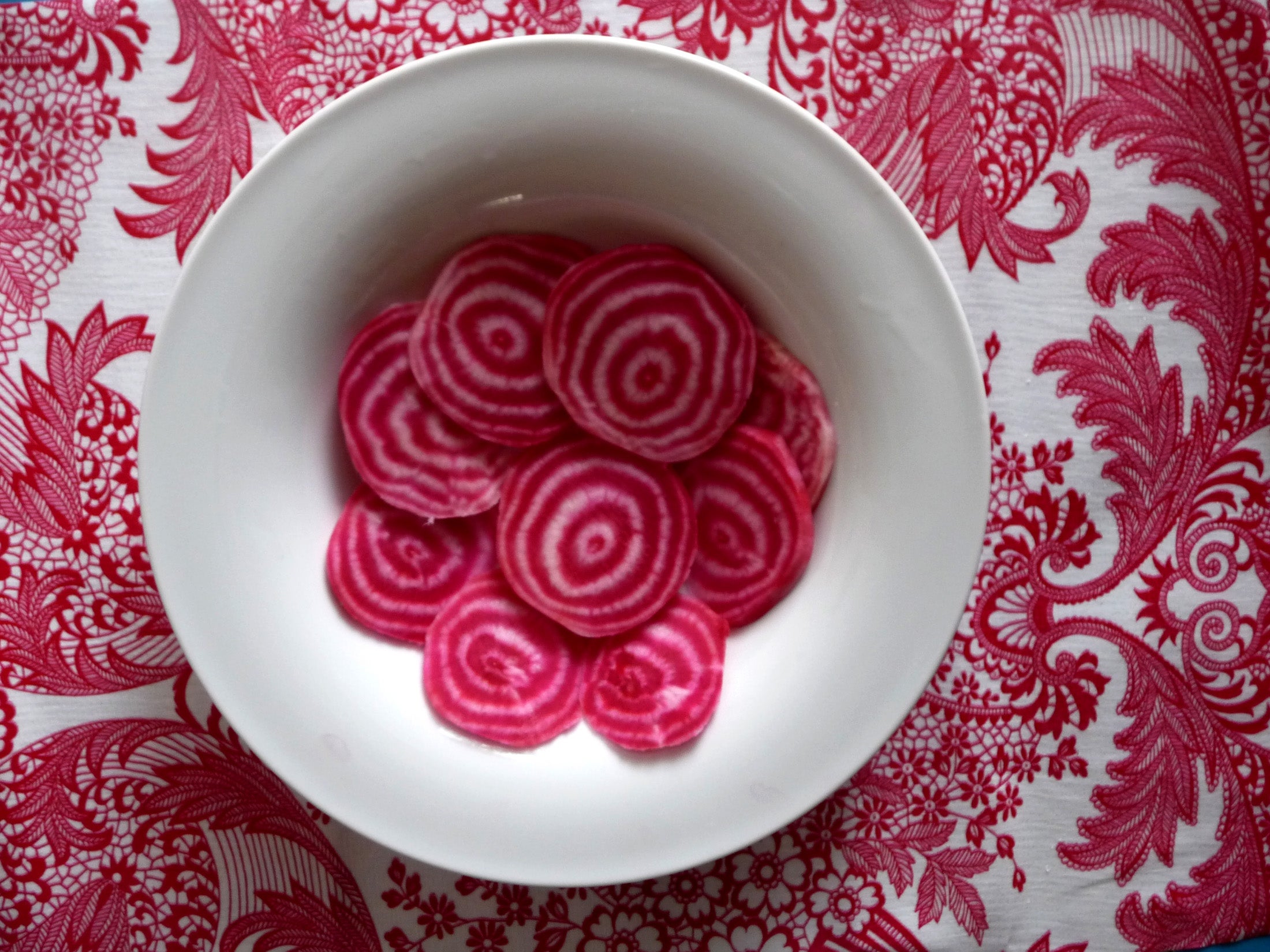 Slices of red and white striped beetroot