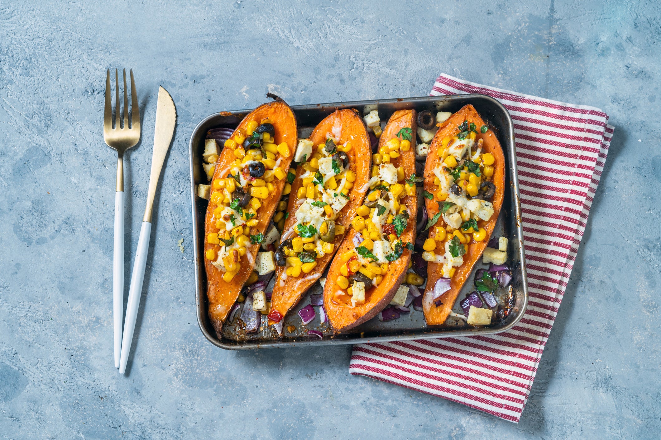 Baked Sweet potatoes with corn tofu  olives