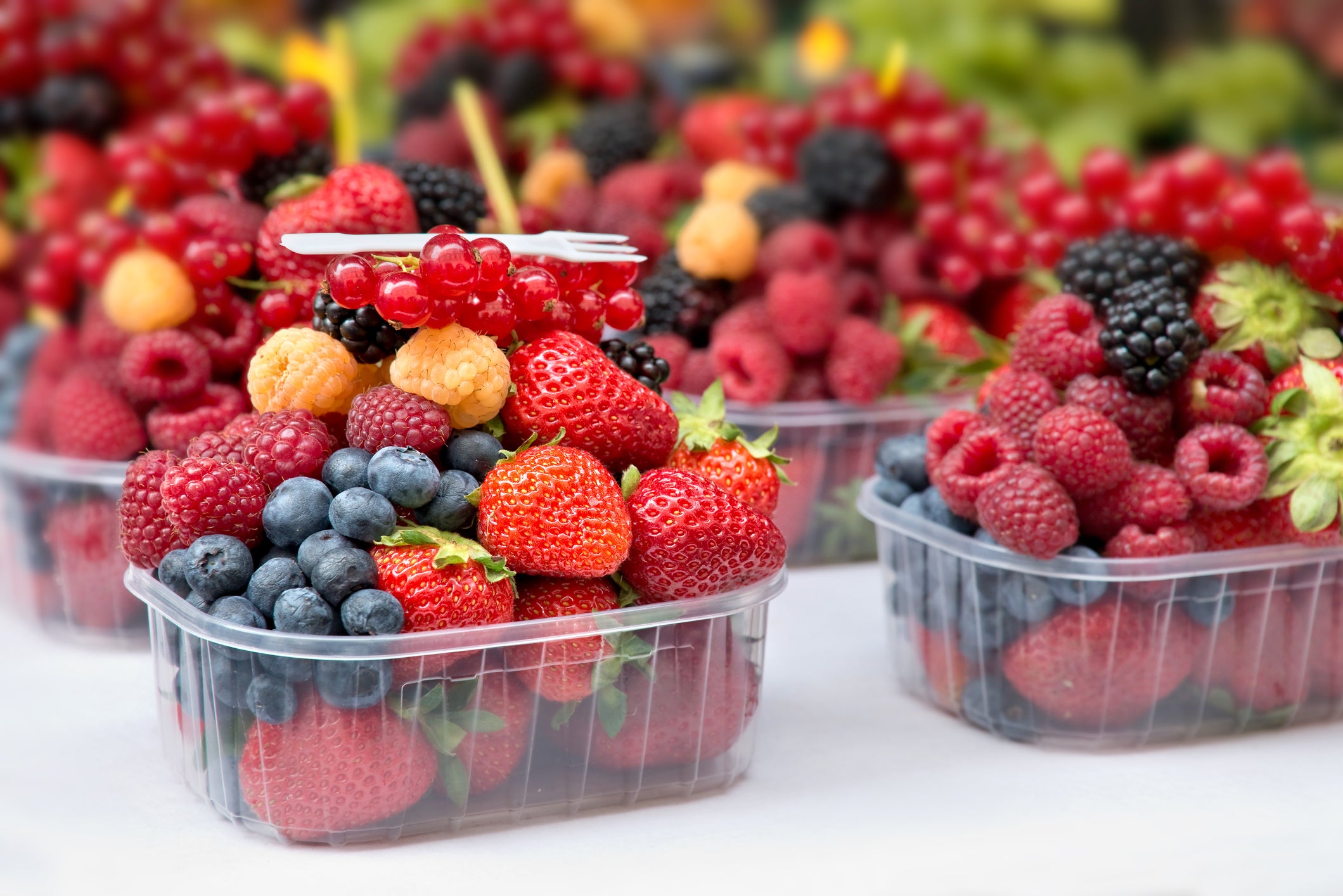 Mixed fresh berries ready to eat at the market