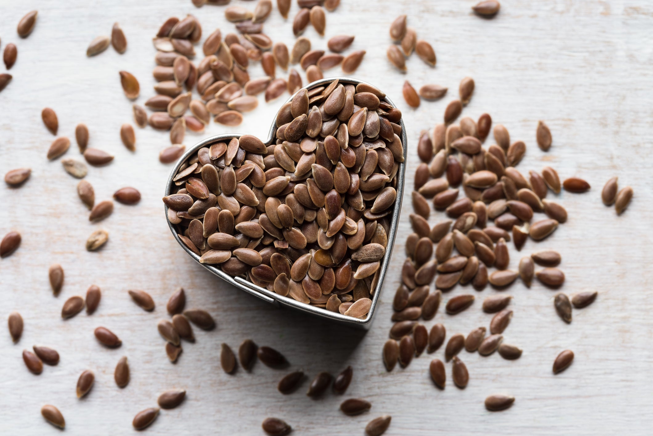 Close-Up Of Flax Seeds On Table