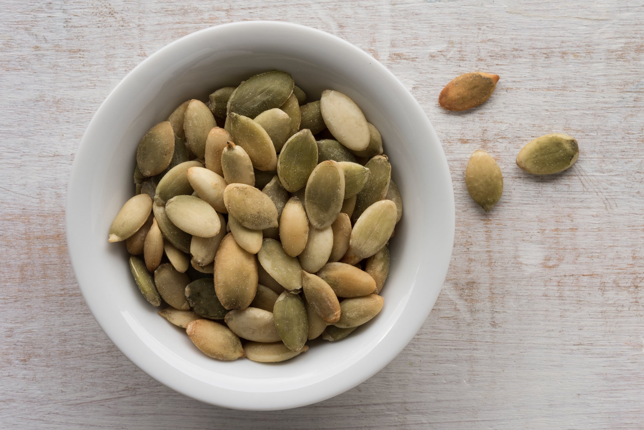 Close-Up Of Pumpkin Seeds On Table