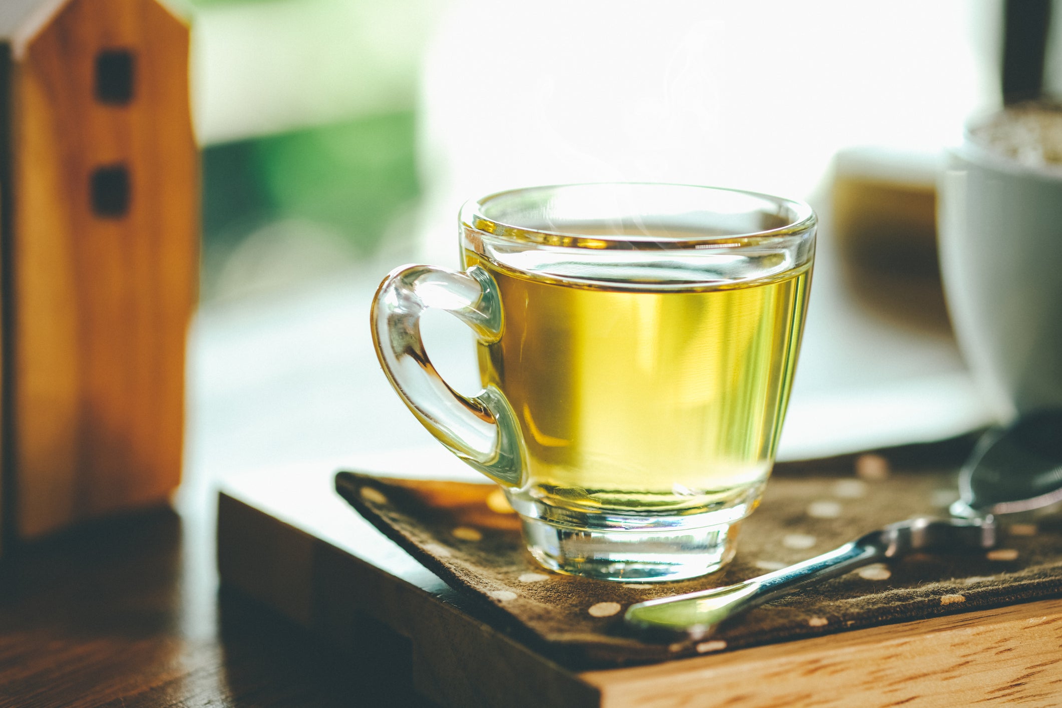 Close-Up Of Green Tea In Cup On Table